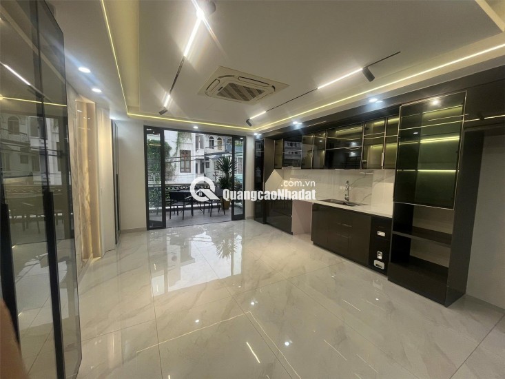 Siêu phẩm nhà đẹp mặt đường Đông Trà 5 tầng thang máy ô tô đỗ cửa kinhdoanh buôn bán tốt